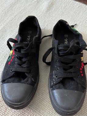 Black sneakers with floral embroidery